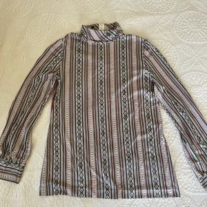 Women’s 70’s vintage lightweight polyester mock turtleneck top.